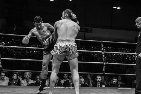  Pornsanae Sitmonchai  strikes a high kick on the head of Yetkin Ozkul during their fight at the ‟Best of Siam IV‟