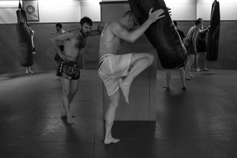  Jean-Charles Skarbowsky advices  his pupil, during a session of punching bag at Naraï gym, Paris.