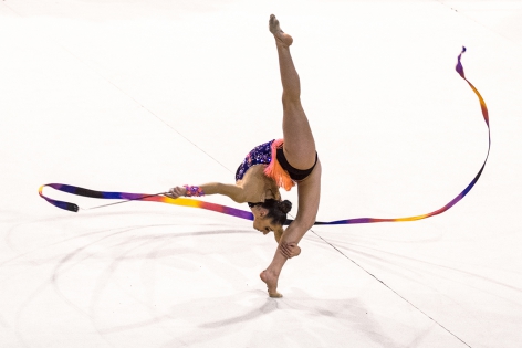  Portuguese gymnast Rafaela Valente competes with the ribbon during the individual all-round rhythmic gymnastics event of the Brussels Cup 2014.