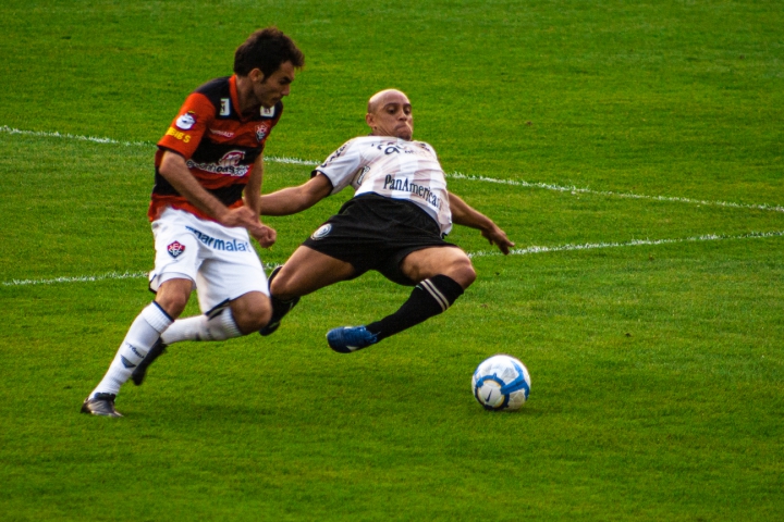  Roberto Carlos of team Corinthians disputes the ball during a match of the Brazilian Soccer championship.