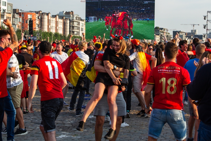  Fans react after Belgian team scored during a World Cup Soccer match between Belgium vs. Brazil.